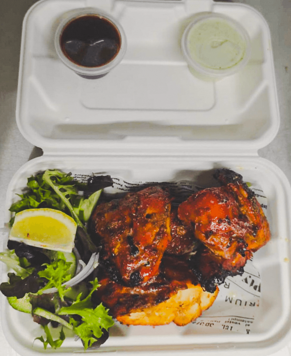 Punjabi Bytes tandoori chicken served with salad, lemon and sauces