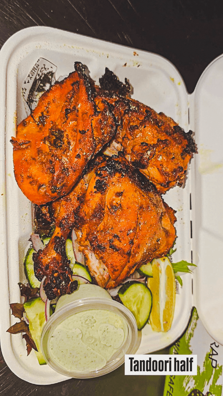 A half serve of Punjabi Bytes tandoori chicken with salad and mint sauce